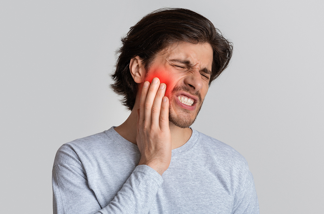 Man with tooth pain in Greensboro NC - MANGO DENTAL Emergency Dentist in Greensboro NC